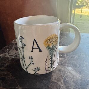 Anthropologie White Mug with Yellow Floral Design
